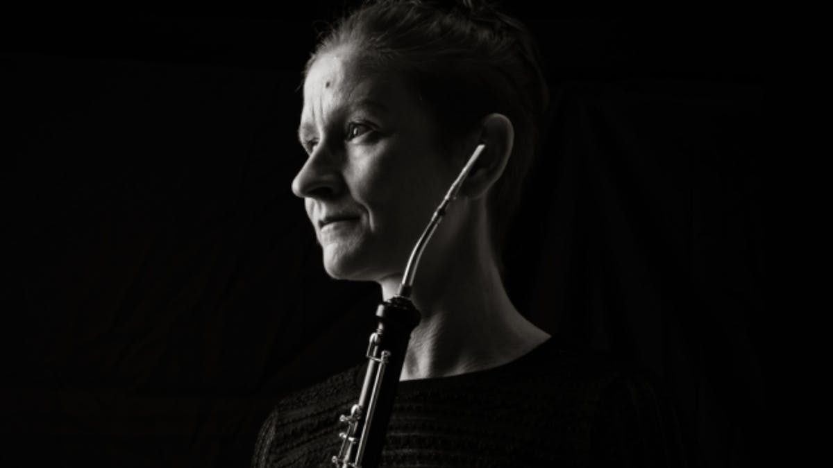 Black-and-white portrait of a cor anglais in profile, looking toward the light