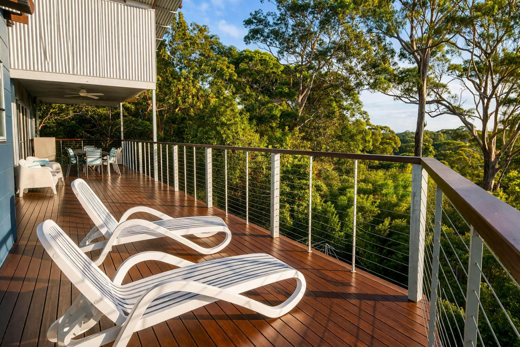 Elevated position with sweeping water and bushland views, designed for total relaxation