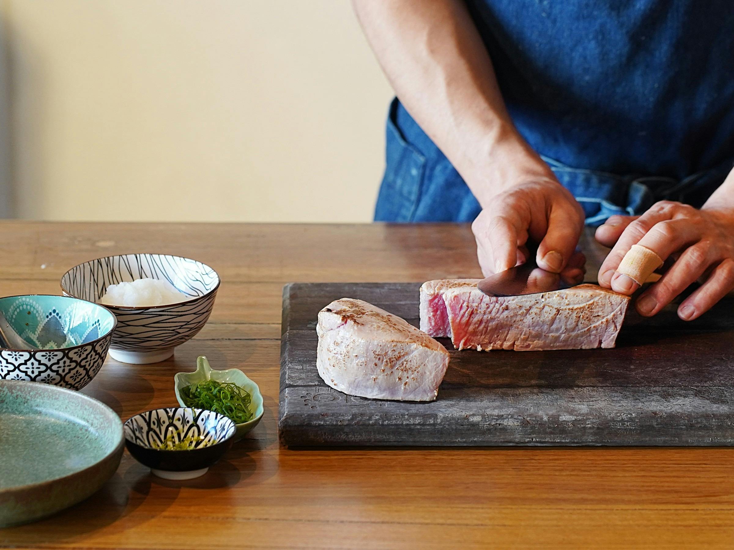 Chef slicing fresh fish at the Fish and Seafood workshop