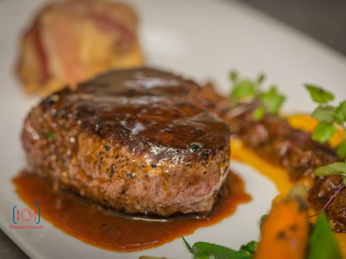 Beef on plate with sauce