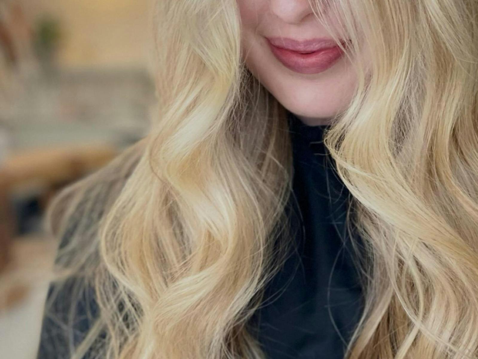 girl with blonde curly hair