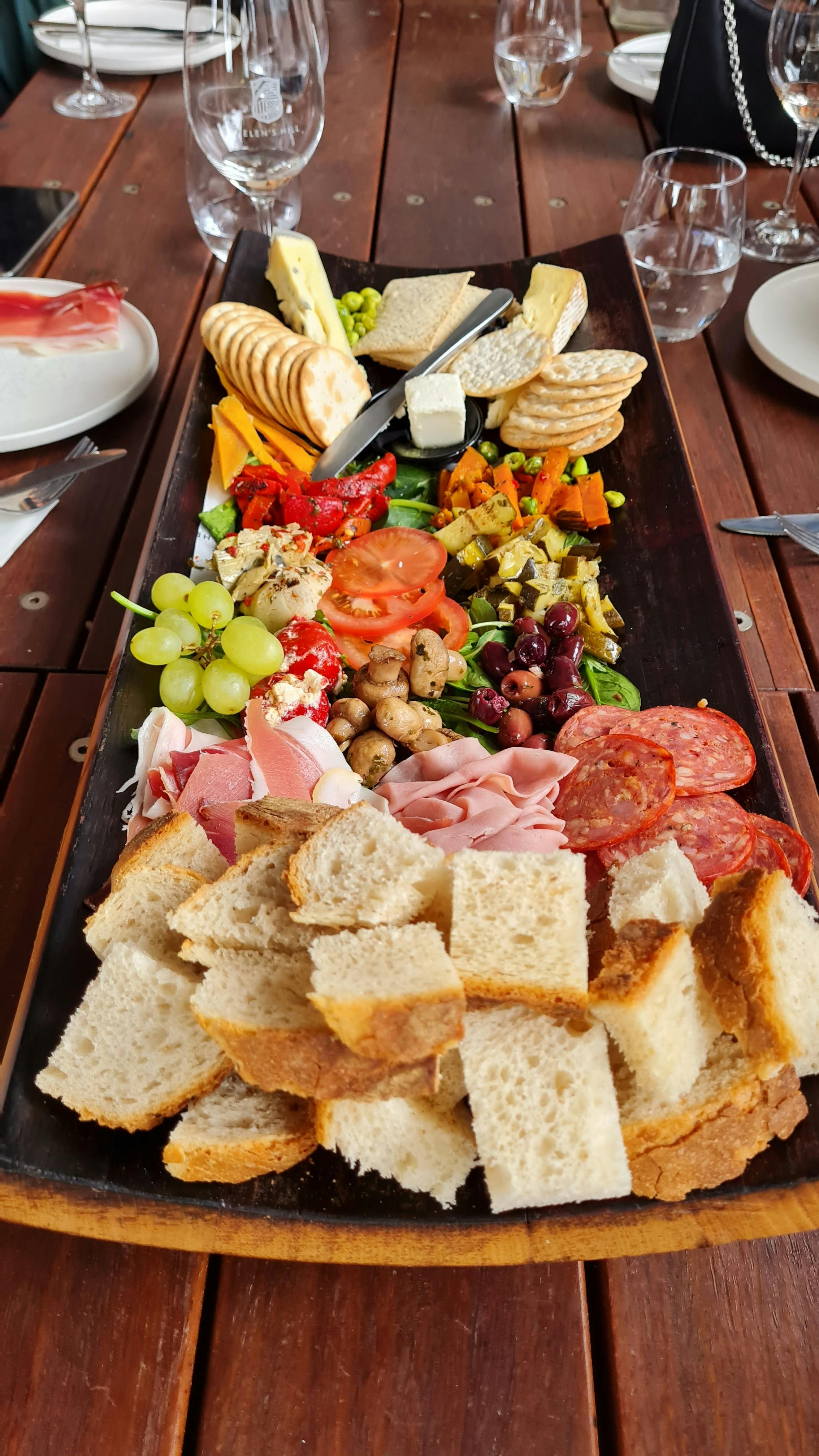 Grazing board with meats, cheeses and fruits