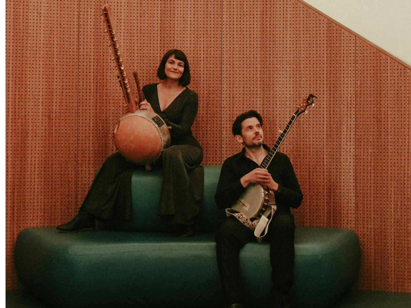 2 performers playing instruments