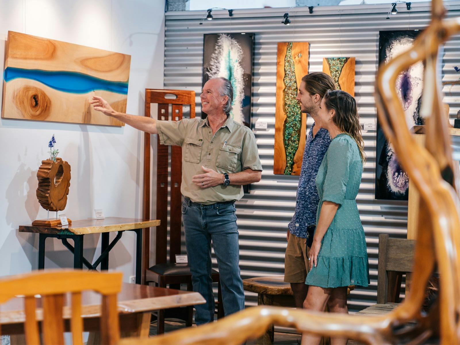 Visitors to David Suters Timbercraftsman Gallery Eumundi viewing timber art and meeting the maker Visitors to David Suters Timbercraftsman Gallery Eumundi viewing timber art and meeting the maker