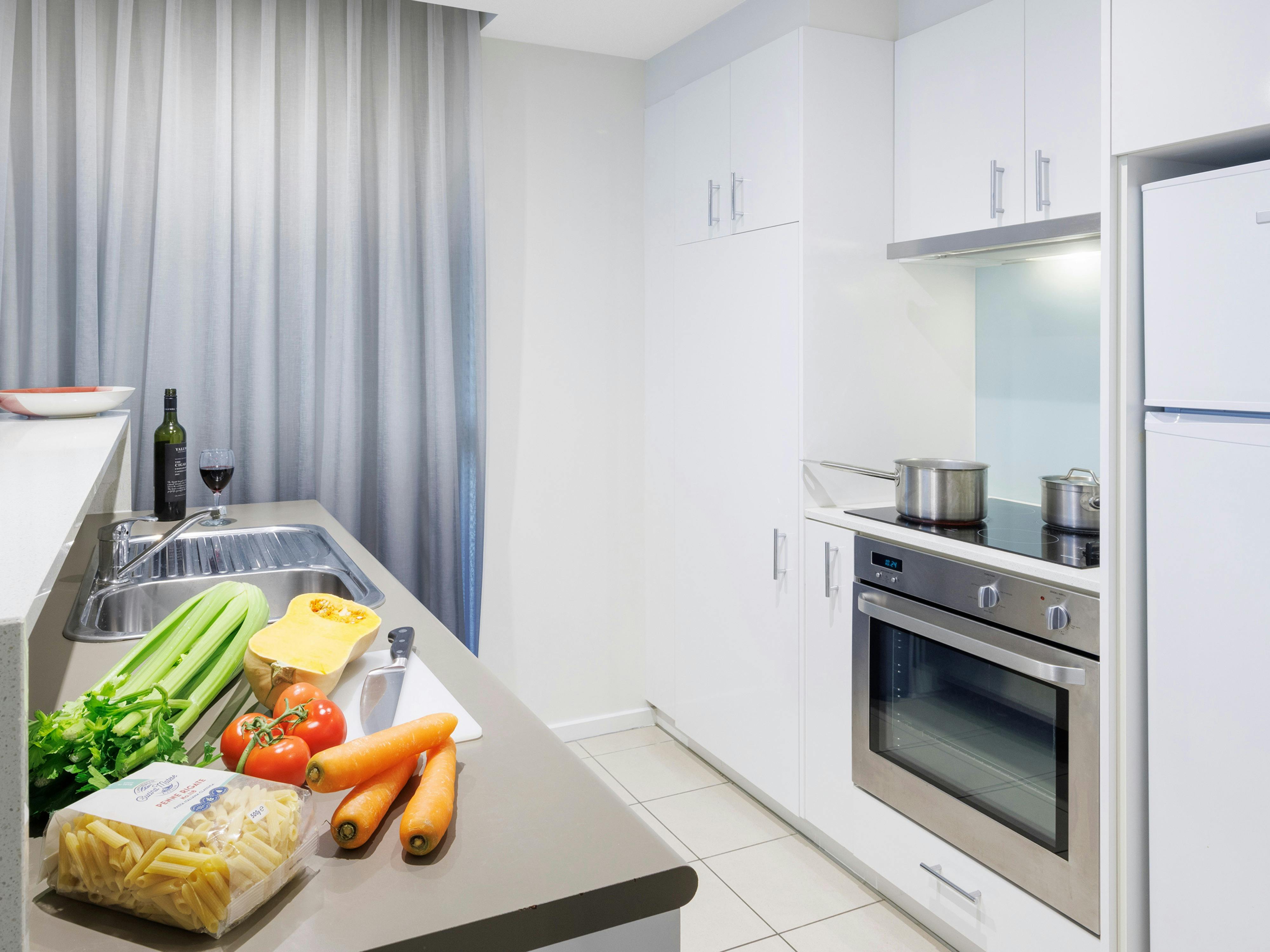 One Bedroom Balcony Apartment - Kitchen with food