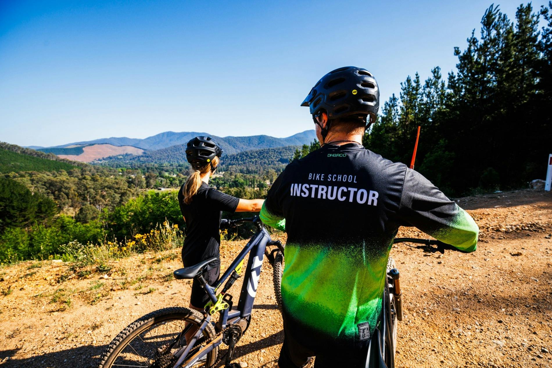 Two riders on Mystic Bike Park for Bike School lessons