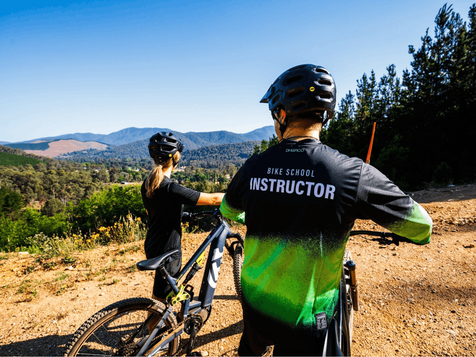 Two riders on Mystic Bike Park for Bike School lessons