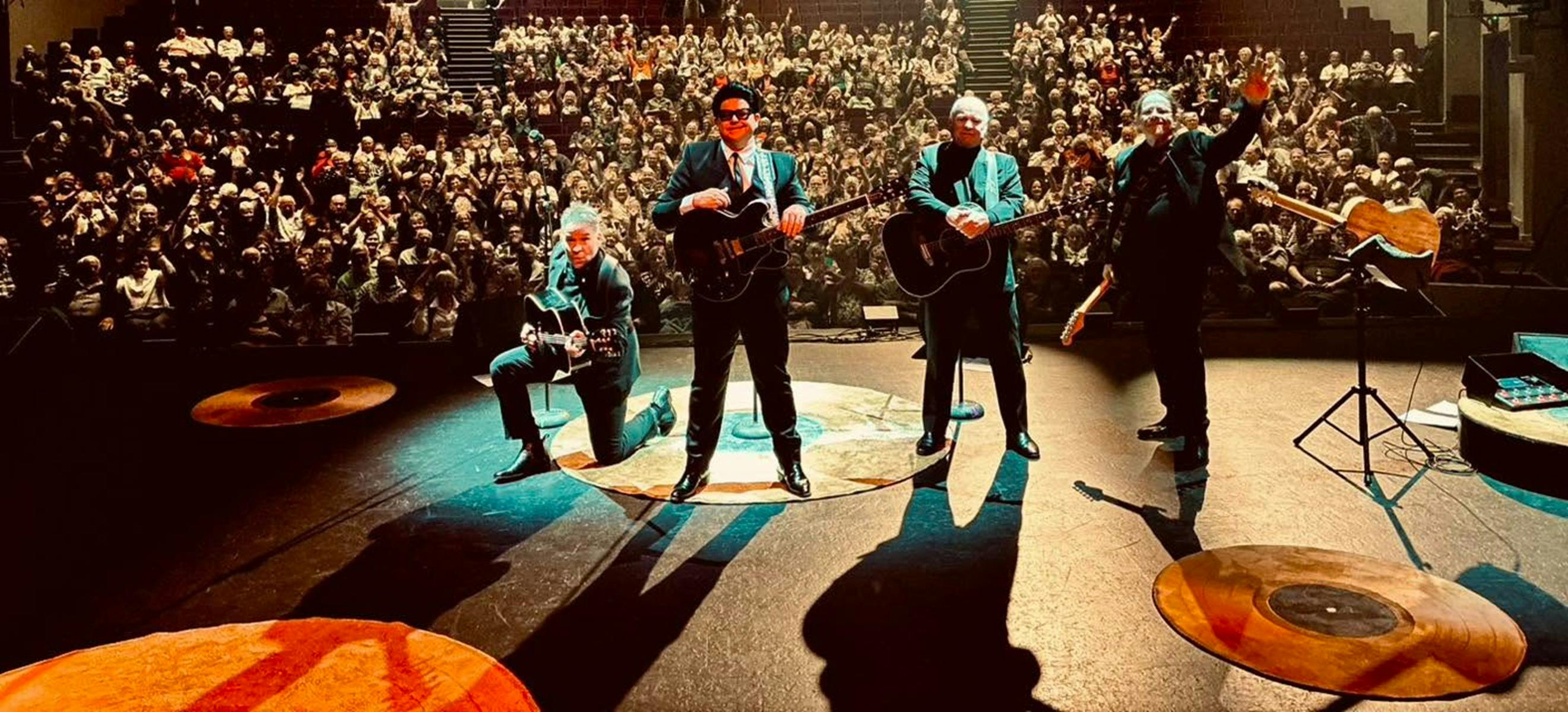 The Robertson Brothers on stage with the audience behind