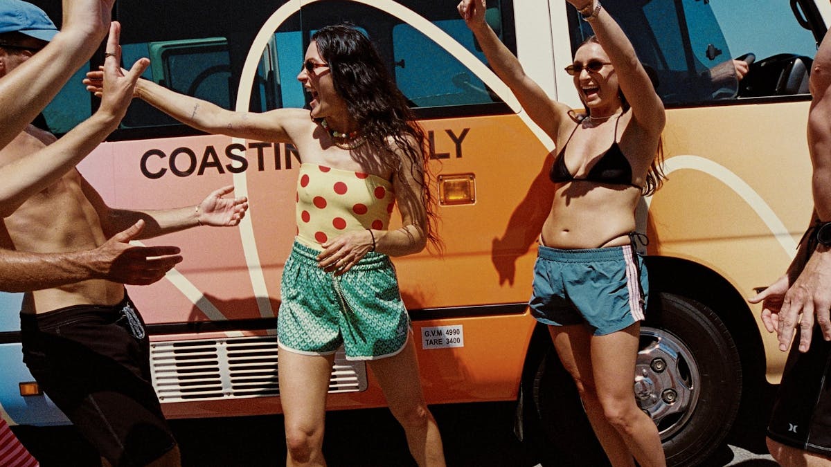 Group of travellers making friends on an East Coast bus trip
