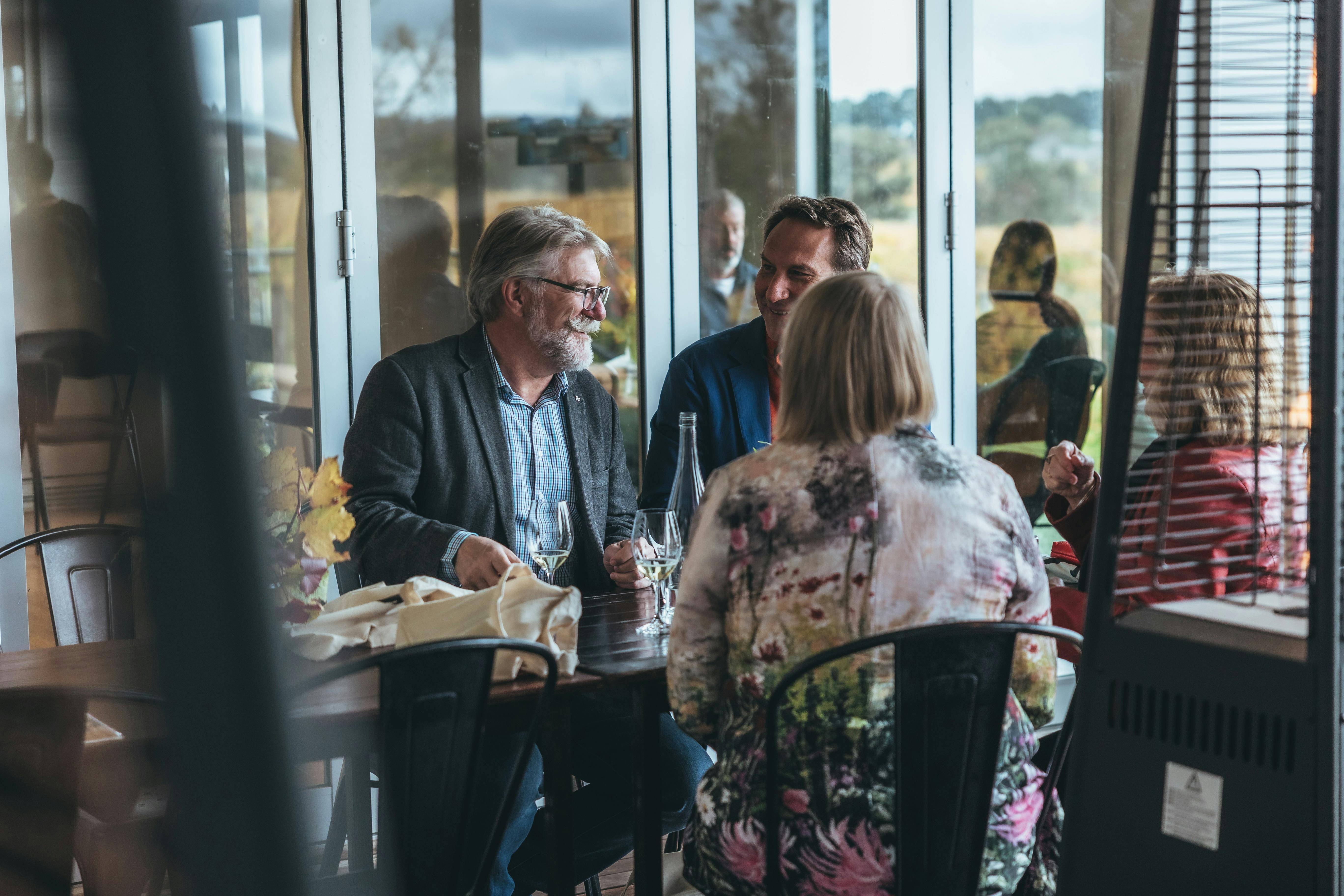 Gorup enjoying wine tasting at The Vintners Daughter Cellar Door