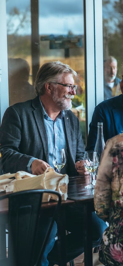 Gorup enjoying wine tasting at The Vintners Daughter Cellar Door