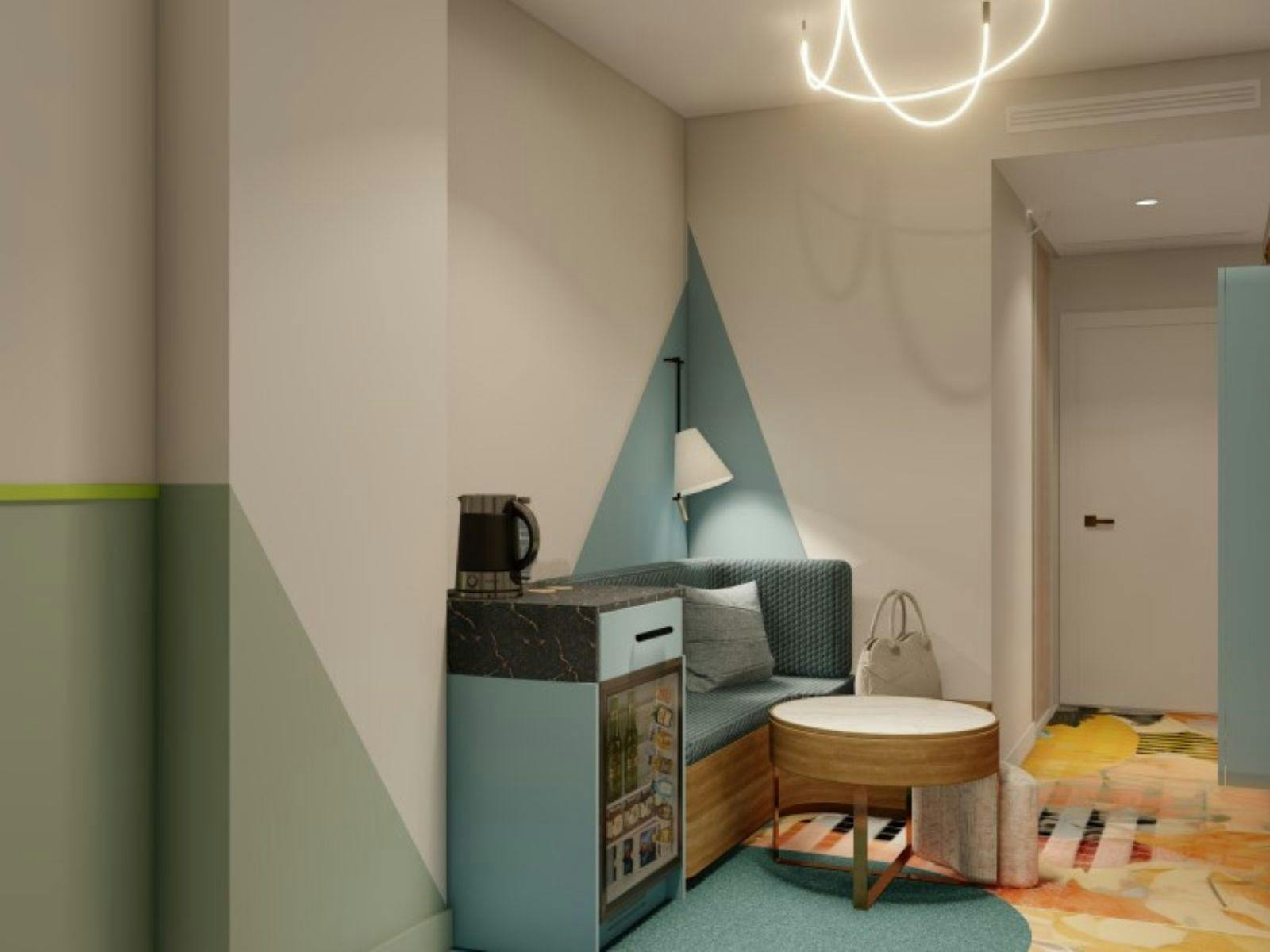 ザ クラレンス ホテル シドニーのデラックス ルームの座席エリア