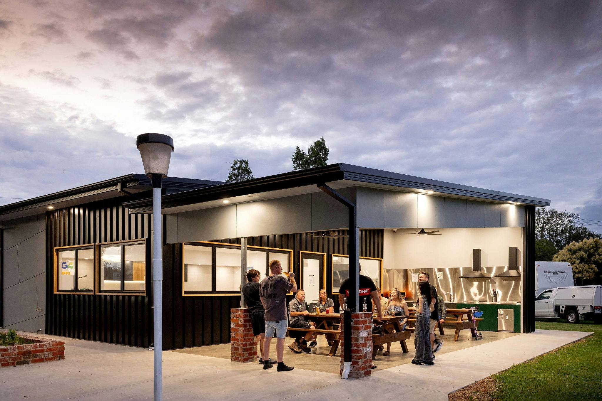 People enjoying the camp kitchen