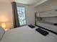 Bedroom with bed and bunk beds