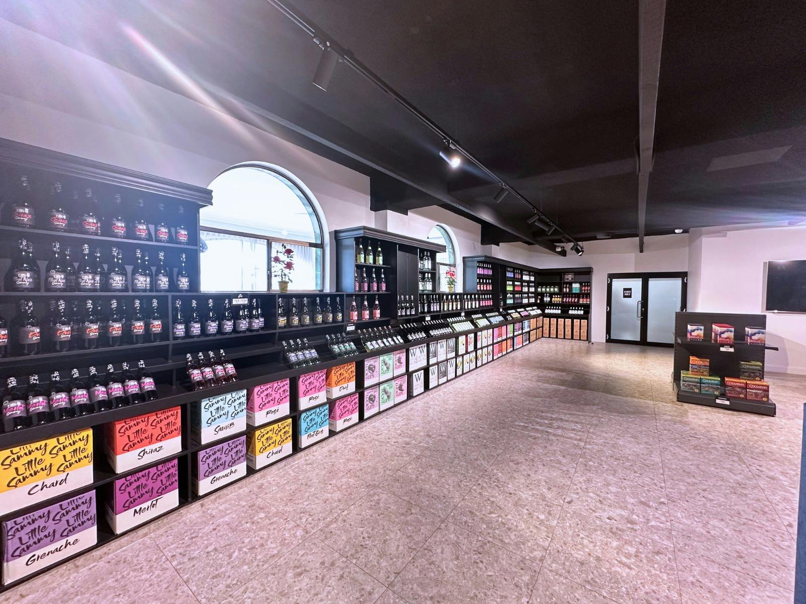 Meditrina Cellar Door showing shelves with bottles wine