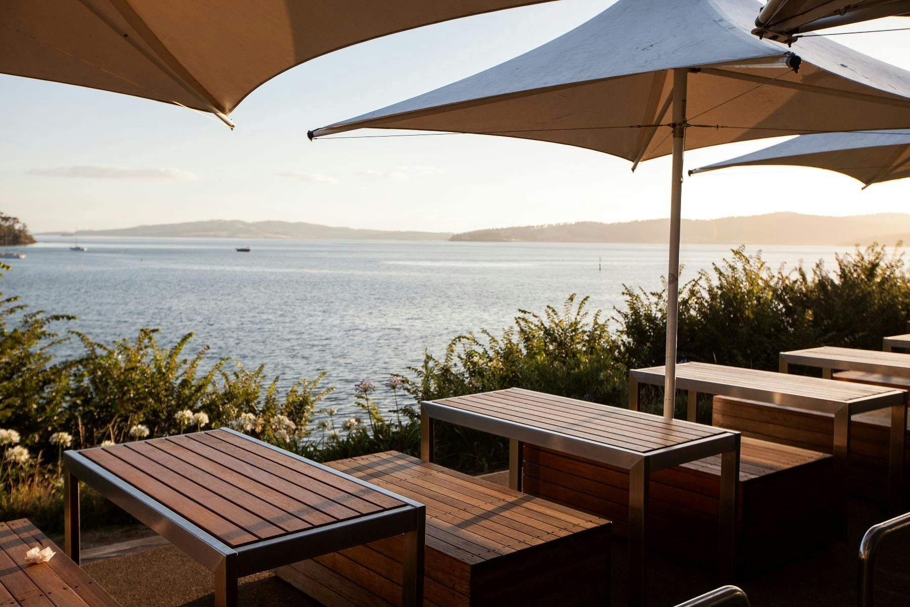 Sunset view on outdoor deck overlooking the water