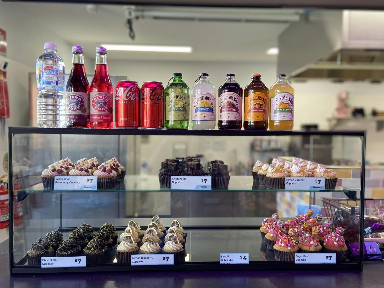 Various beautiful sweet treats in perfect lines.