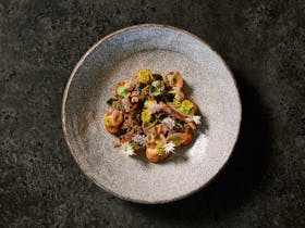 Charred local octopus, carrots, avocado, yuzu, gochujang