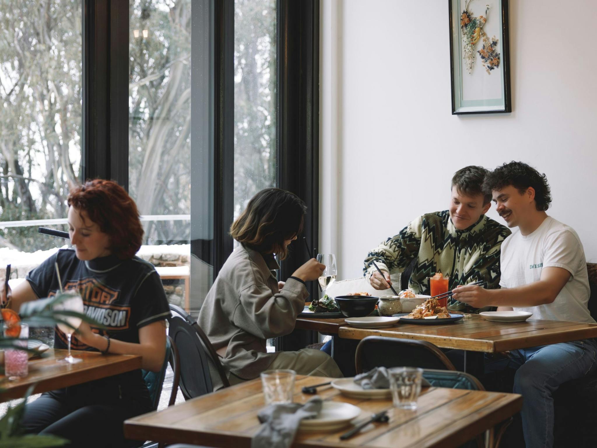 Groups of friends dining at Huski Kitchen