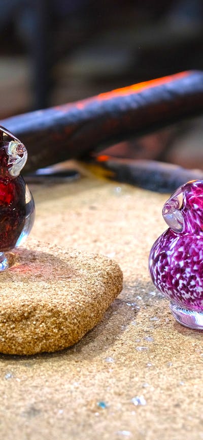Two glass birds in the Hotshop