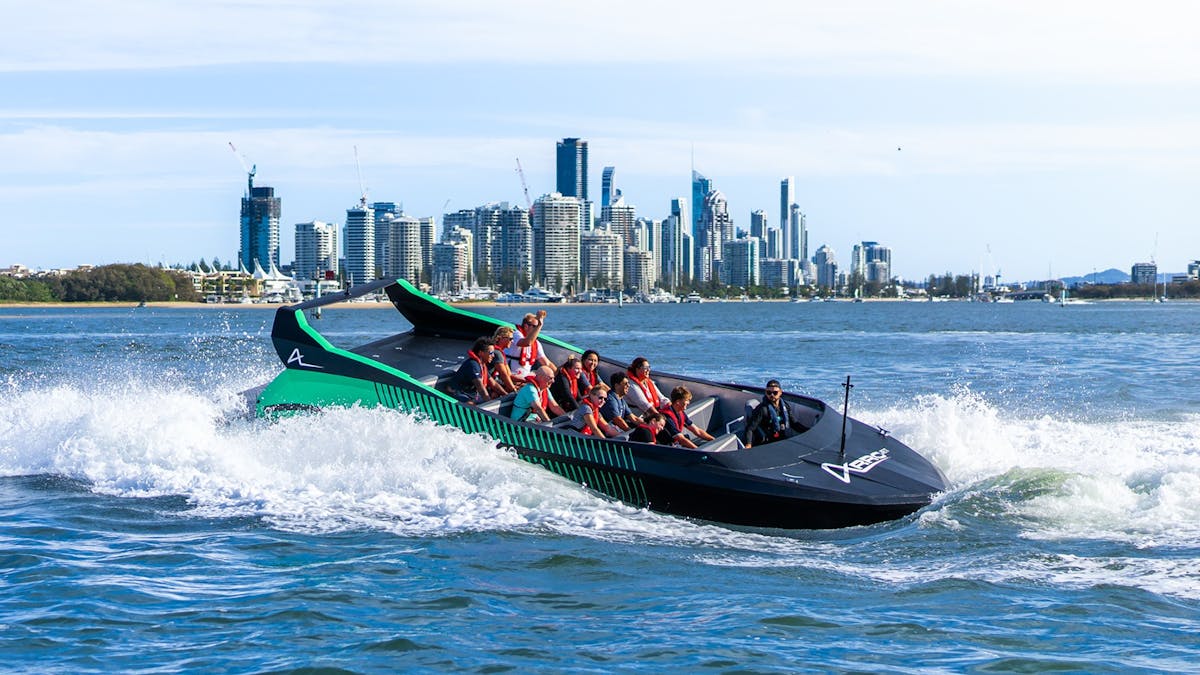 Arro Jet Boat in front of Surfers Paradise skyline.