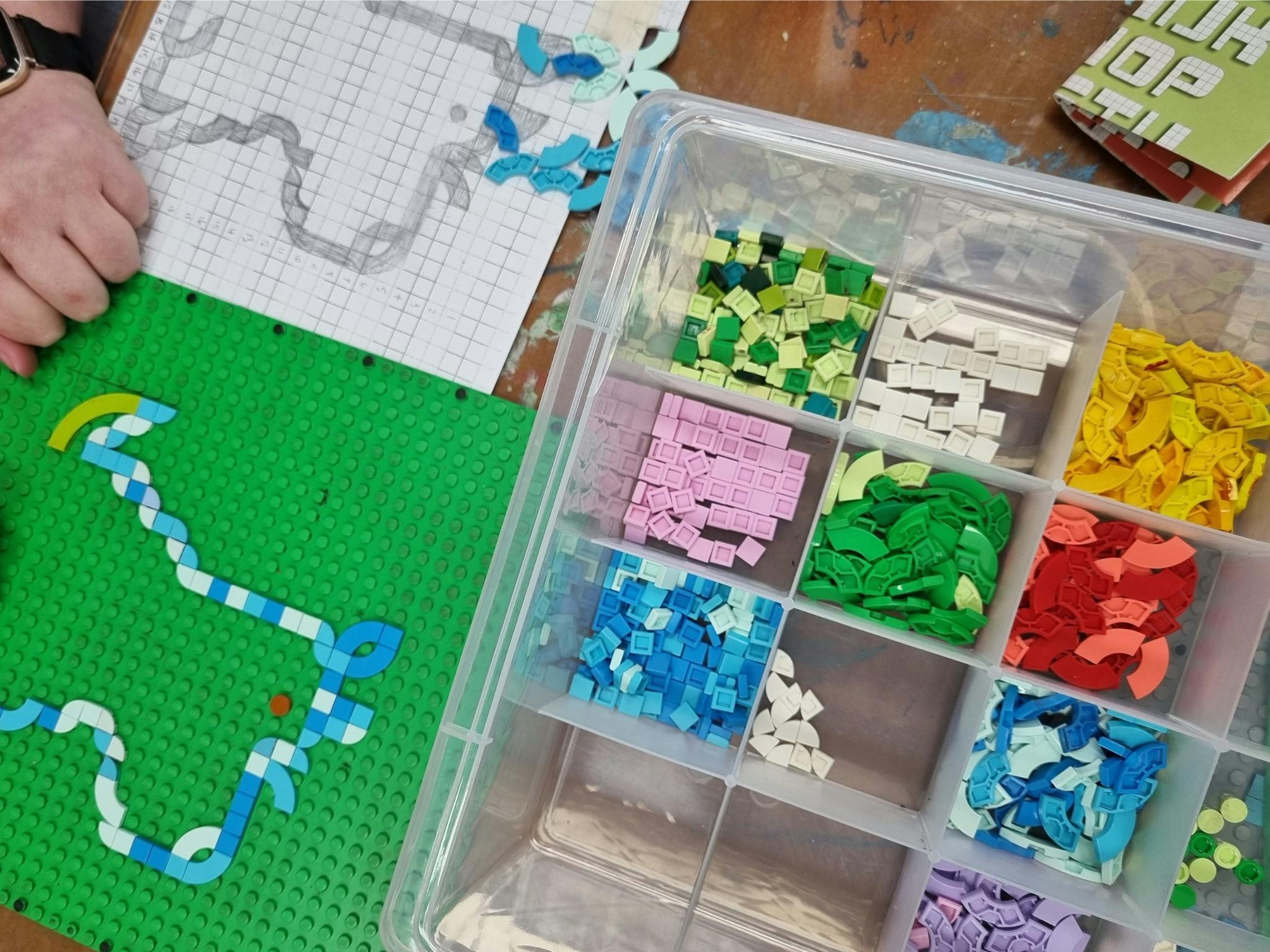 Lego Dots on a Lego baseplate, pixelated dog