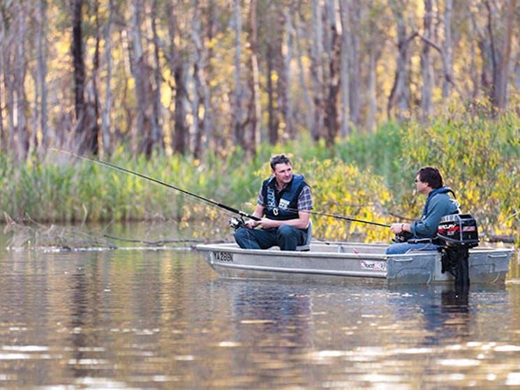 2 friends fishing in a boat on Gulpa Creek in Murray Valley National Park. Photo: David Finnegan