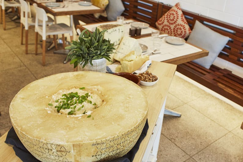 Image of the event 'Flaming Cheese Wheel and Wine Experience: Broadway'