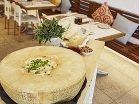 Flaming Cheese Wheel and Wine Experience