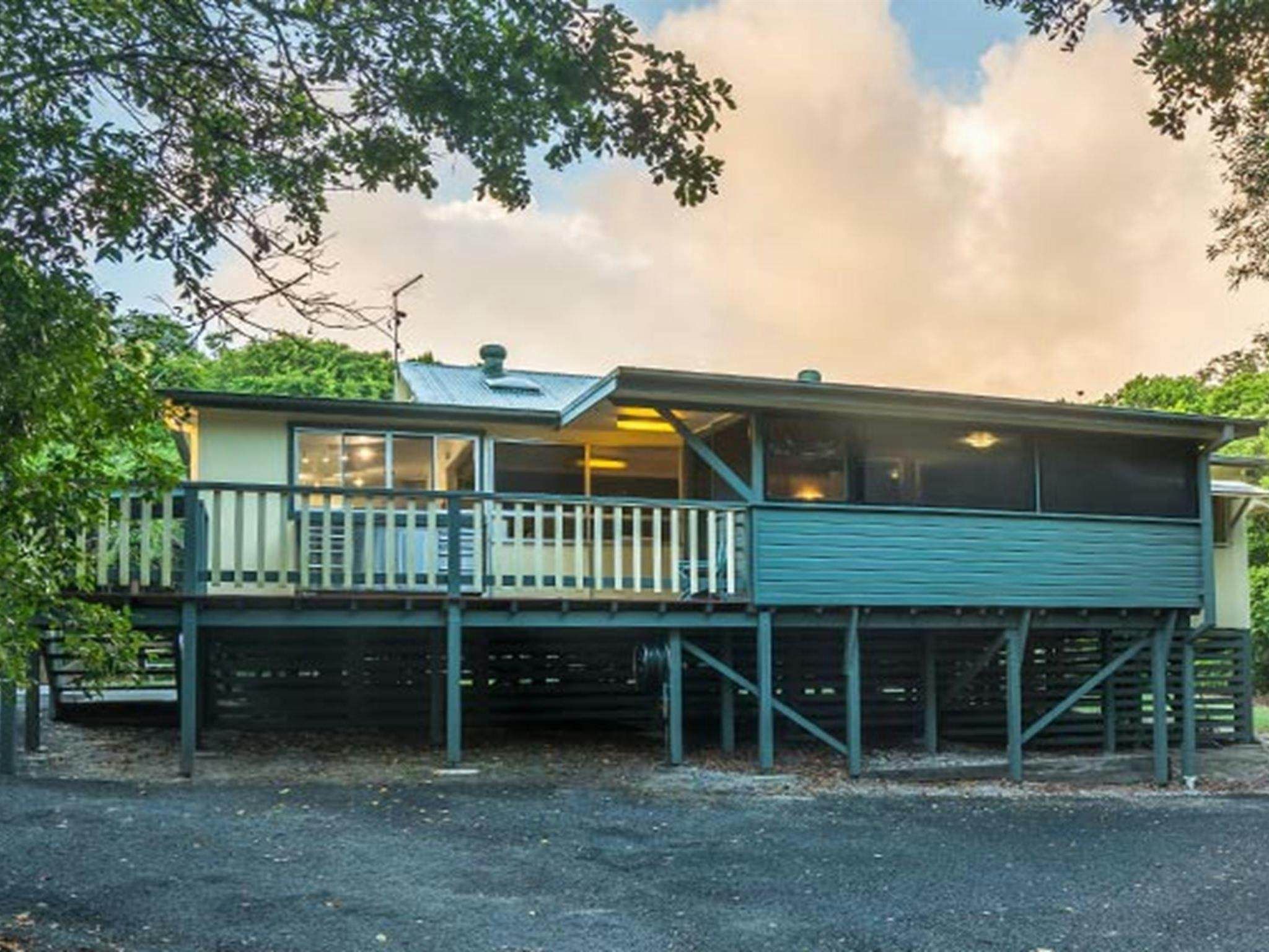 Exterior view of Forest House balcony at twilight, Bundjalung National Park. Photo: J Spencer/OEH