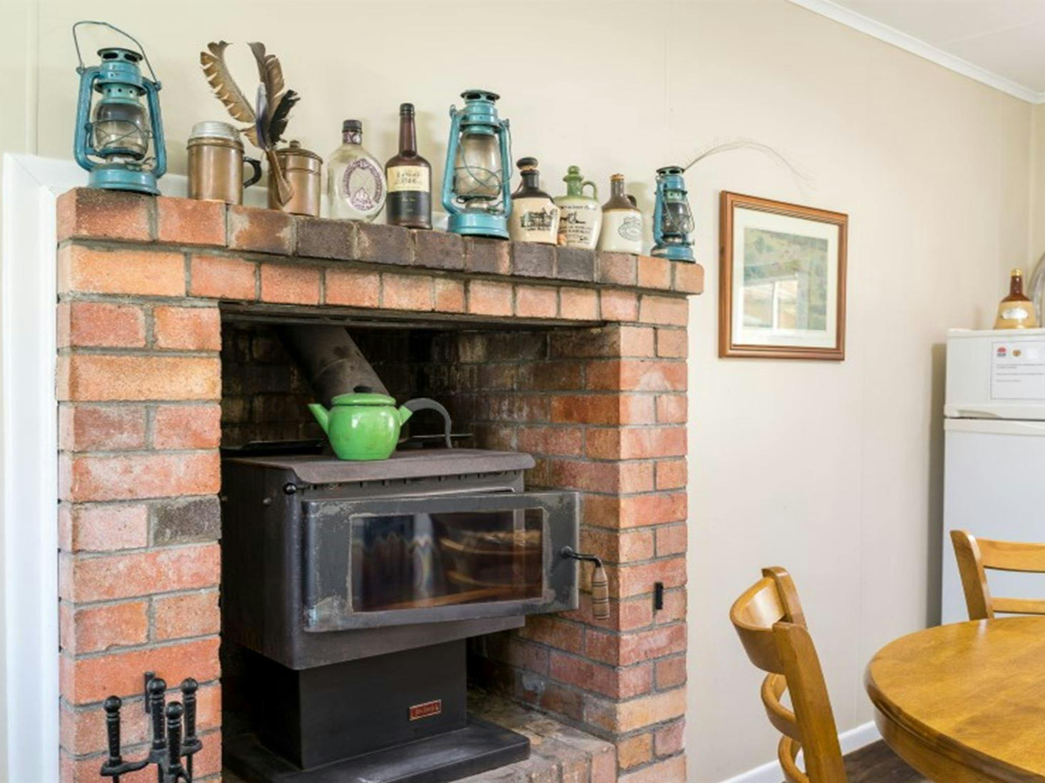 The indoor wood heater at Four Bull Hut in Washpool National Park. Photo &copy; DPE