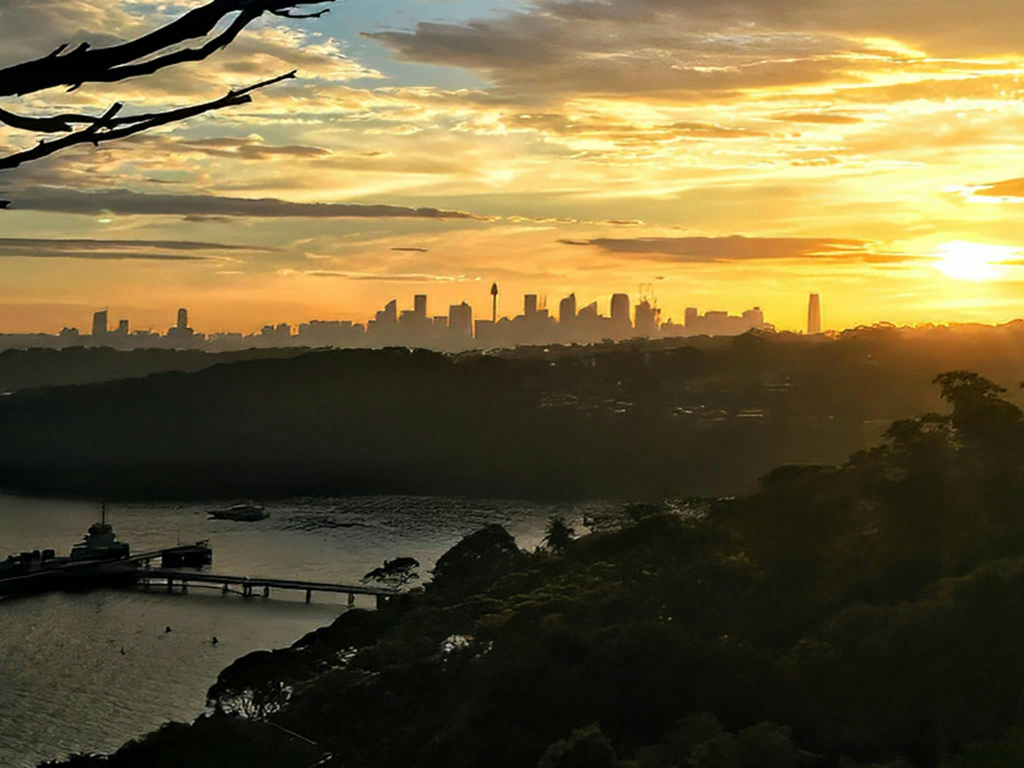 Sunset over the Sydney skyline from Georges Head, Sydney Harbour National Park. Photo: Kaushik