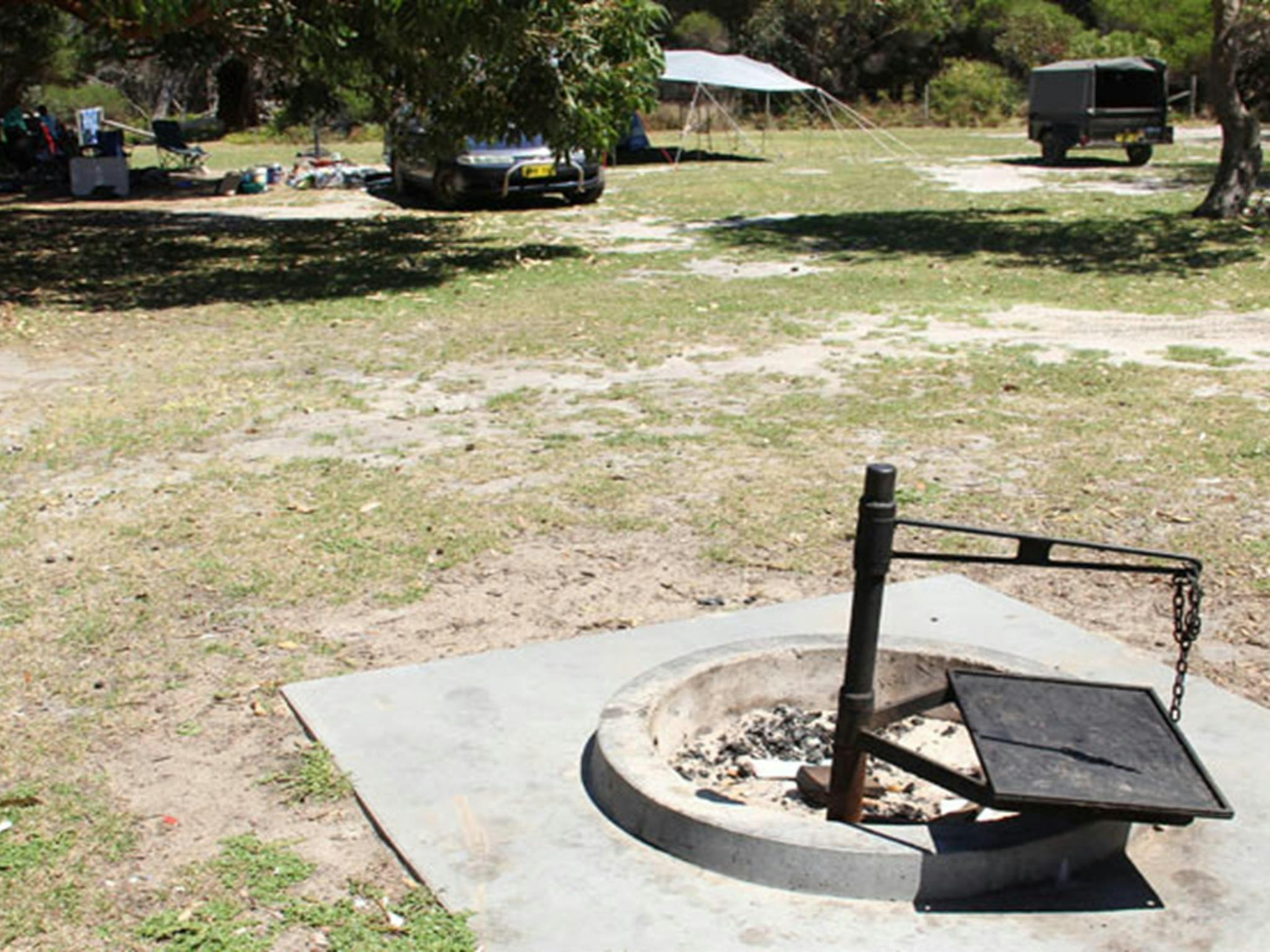 A fire ring at Gillards campground, Mimosa Rocks National Park. Photo: John Yurasek/DPIE