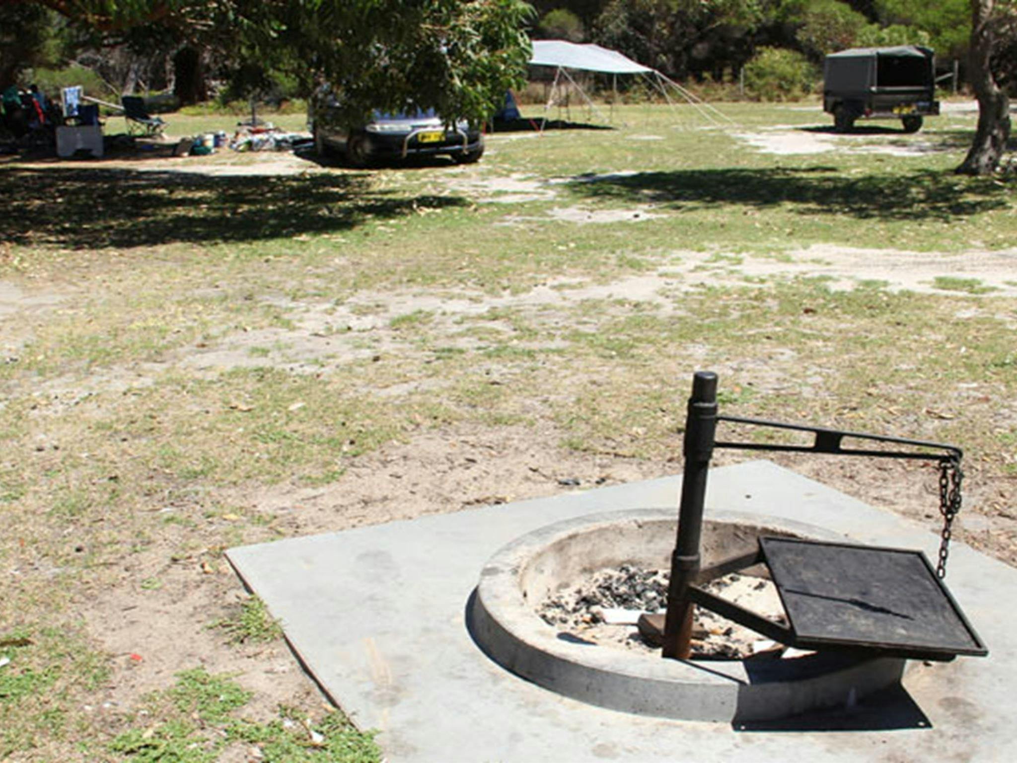 A fire ring at Gillards campground, Mimosa Rocks National Park. Photo: John Yurasek/DPIE