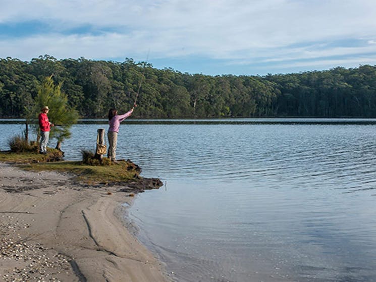 Couple fishing on Burrill Lake, Giriwa walking track, Meroo National Park. Photo: Michael Van Ewijk