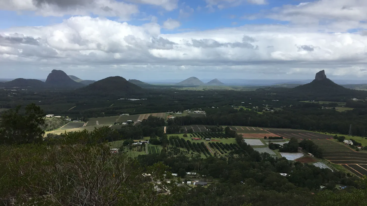 View (1) of Glasshouse Mtns from atop Coochin Twins.
Mt Tibrogargan & Ngungun to Left. 
Mt Coonoowrin to the right
