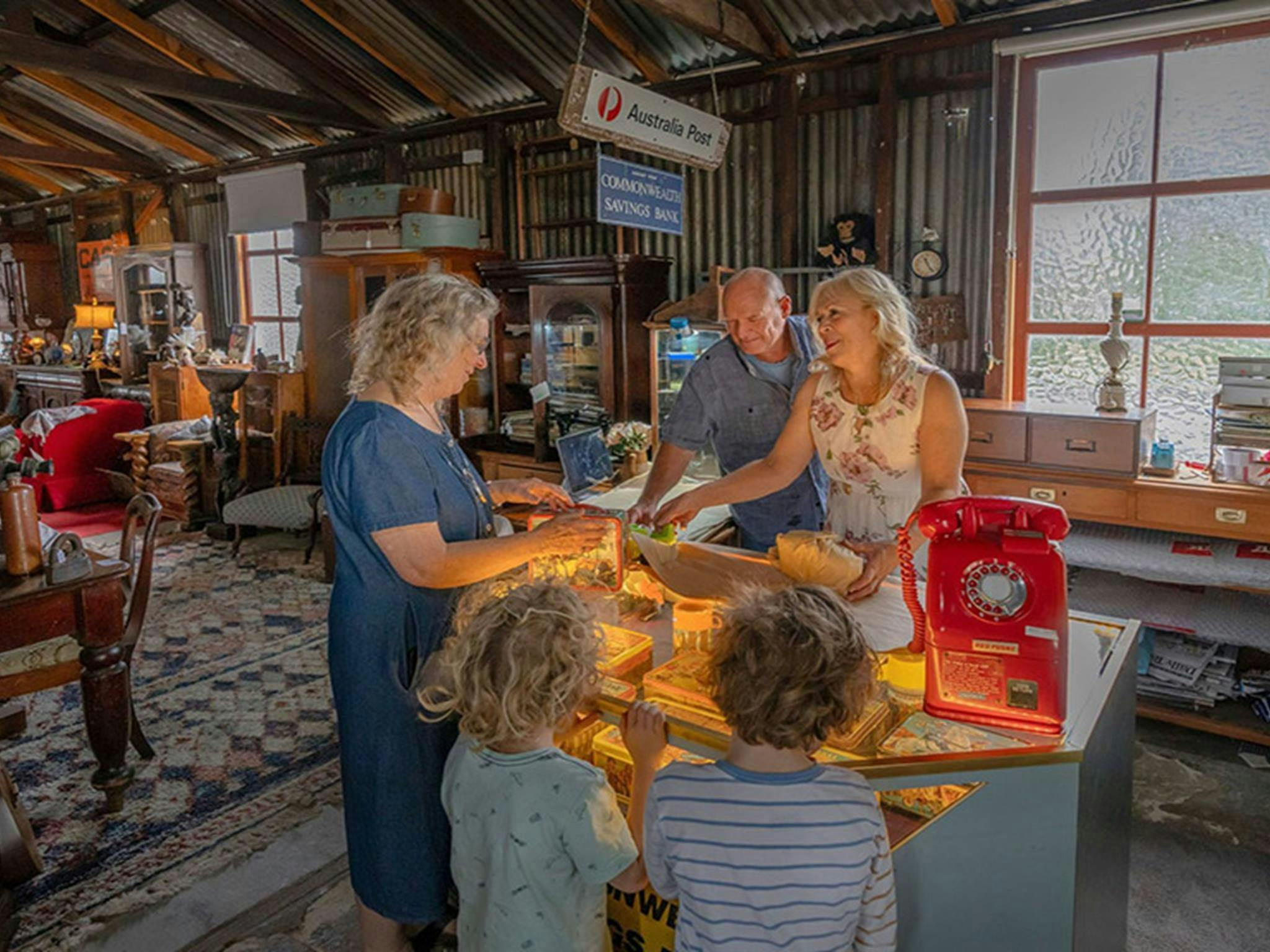 Shoppers at the counter of Gold Rush Antiques, Hartley Historic Site. Credit: John Spencer &copy;