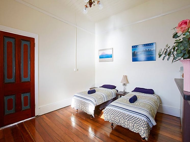 Twin beds in the Cottage 3 bedroom, Green Cape Lightstation Keeper's Cottages. Photo: Nick Cubbin/OE