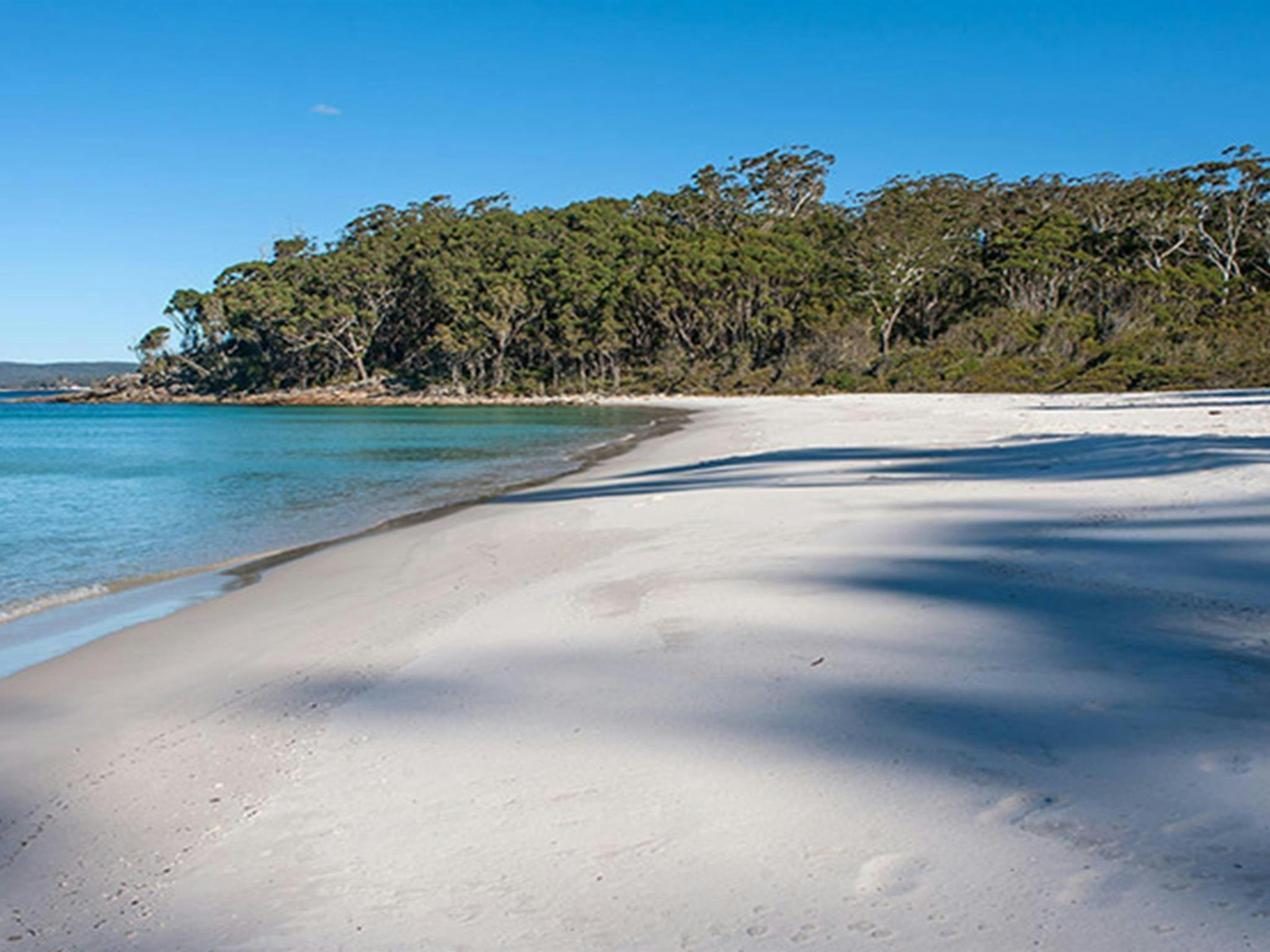 Fußabdrücke im Sand am Greenfield Beach im Jervis Bay Nationalpark. Foto: Michael Van Ewijk