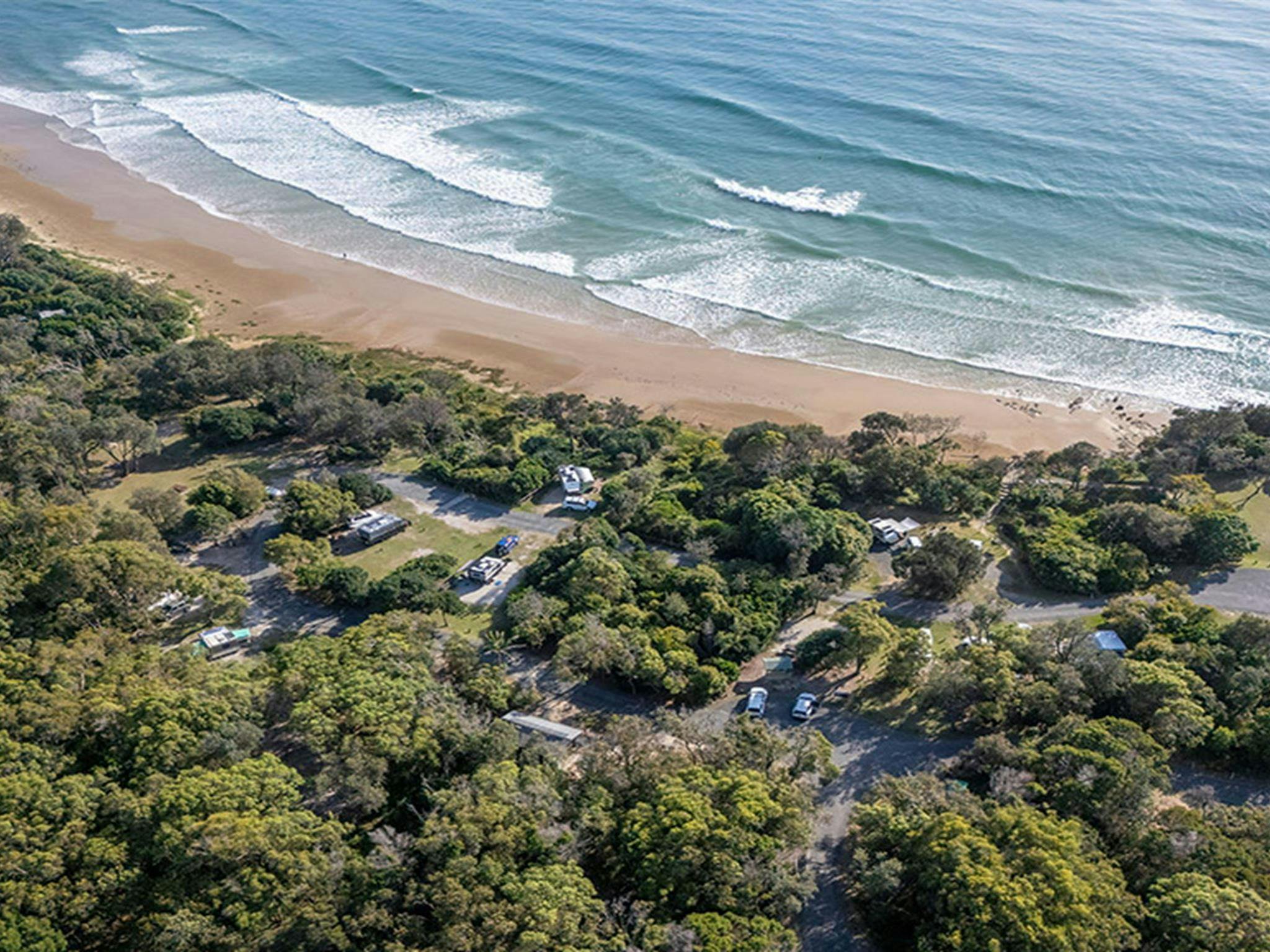 Aerial view of Illaroo campground and Illaroo-Sandon Beach. Credit: John Spencer &copy; DCCEEW