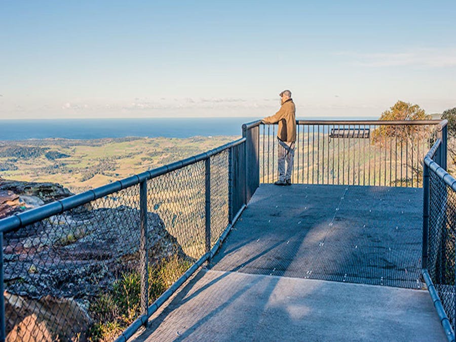 A man stands at Jamberoo lookout, Budderoo National Park. Photo credit: Michael Van Ewijk ©