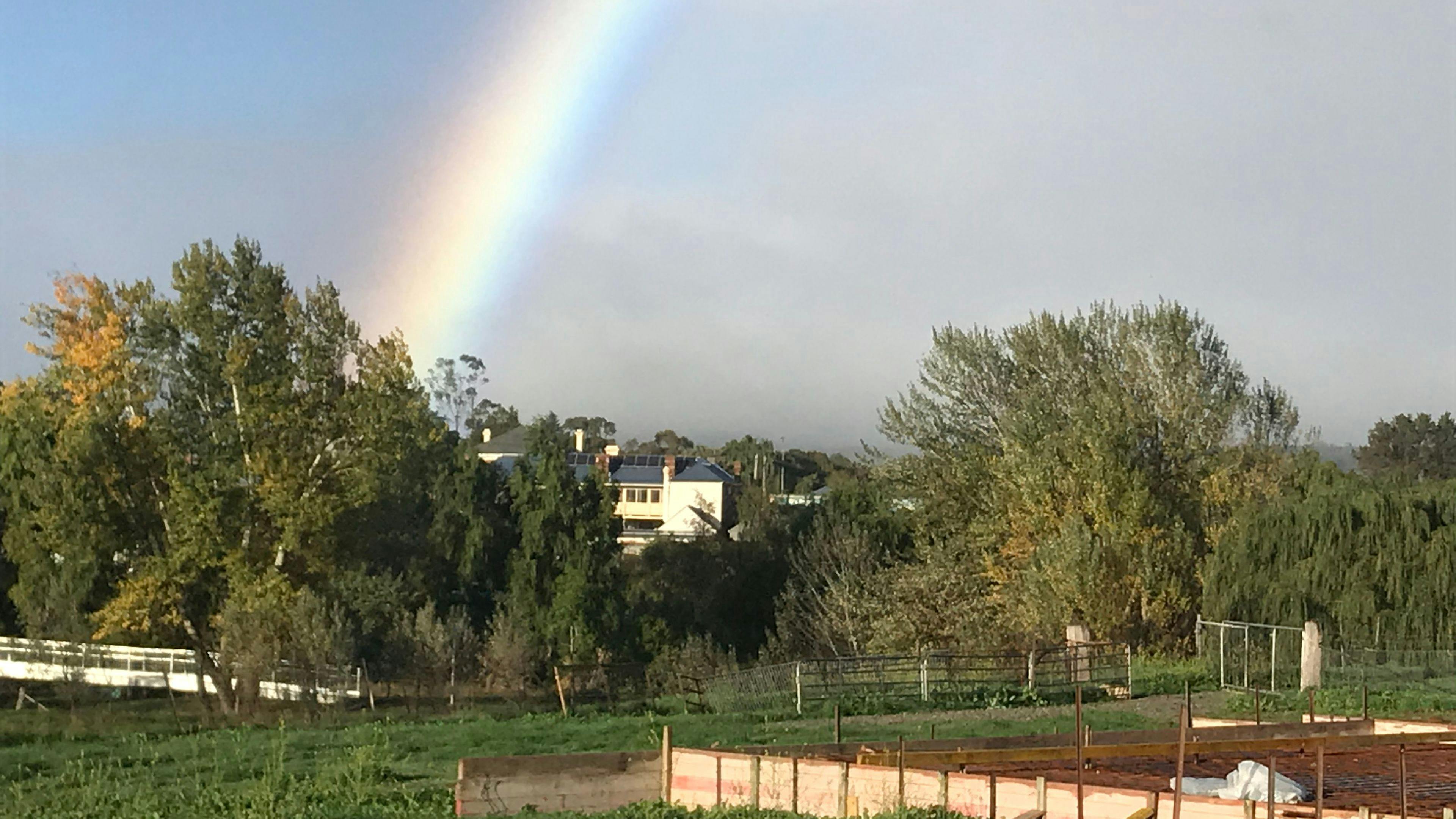 Two minutes walk across pedestrian bridge to cafes and boutique shops