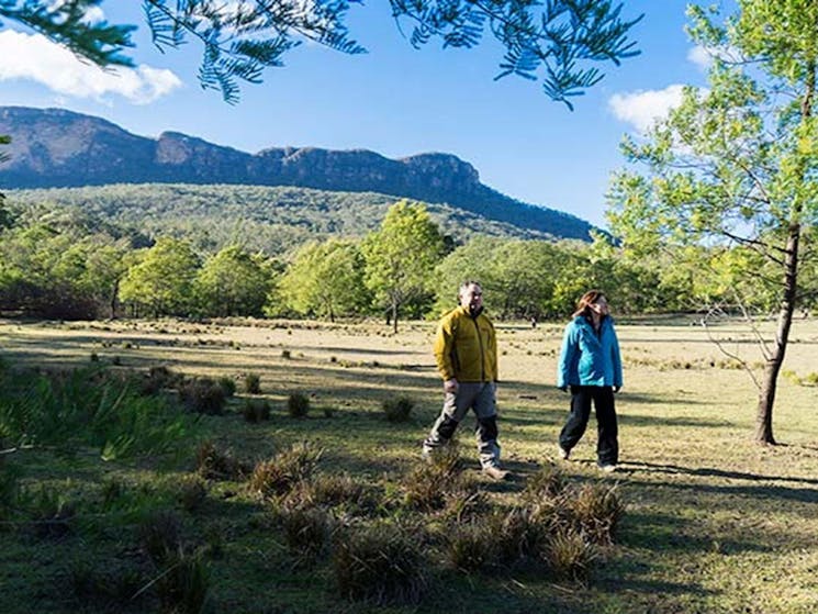 A couple bushwalk near Kedumba River Crossing campground, Blue Mountains National Park. Photo: