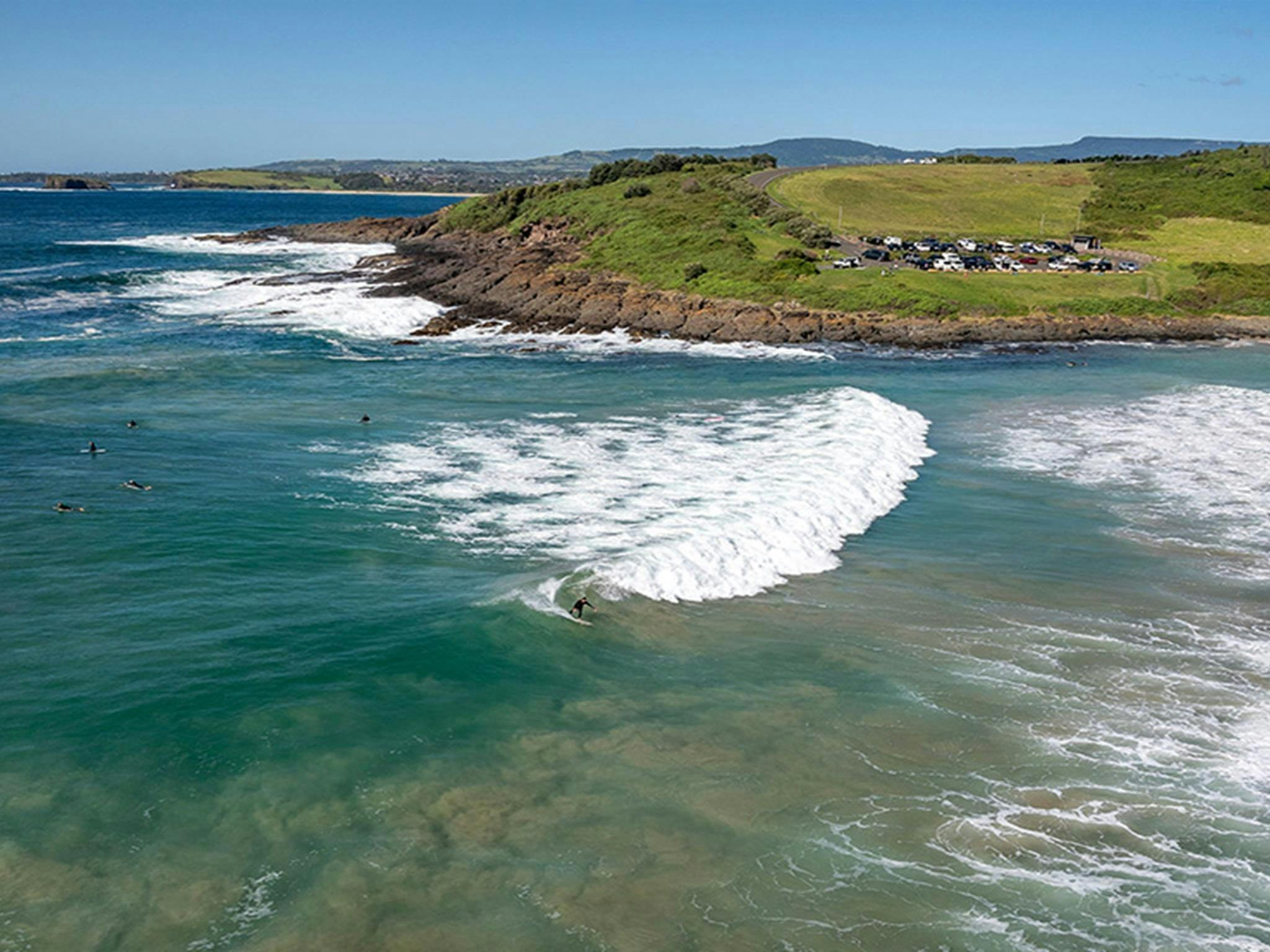 Surfers at Killalea Beach – The Farm. Photo: John Spencer/DCCEEW &copy; DCCEEW