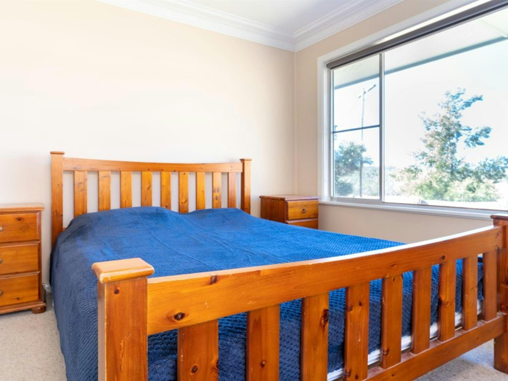 A bedroom with queen bed at Lavender Vale Cottage in Kwiambal National Park. Photo &copy; DPE