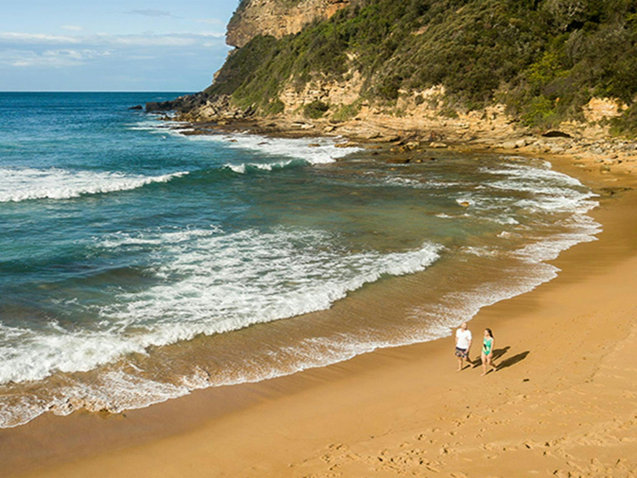 Aerial view of 2 people walking along Little Beach, Bouddi National Park. Photo: John Spencer/DPIE.