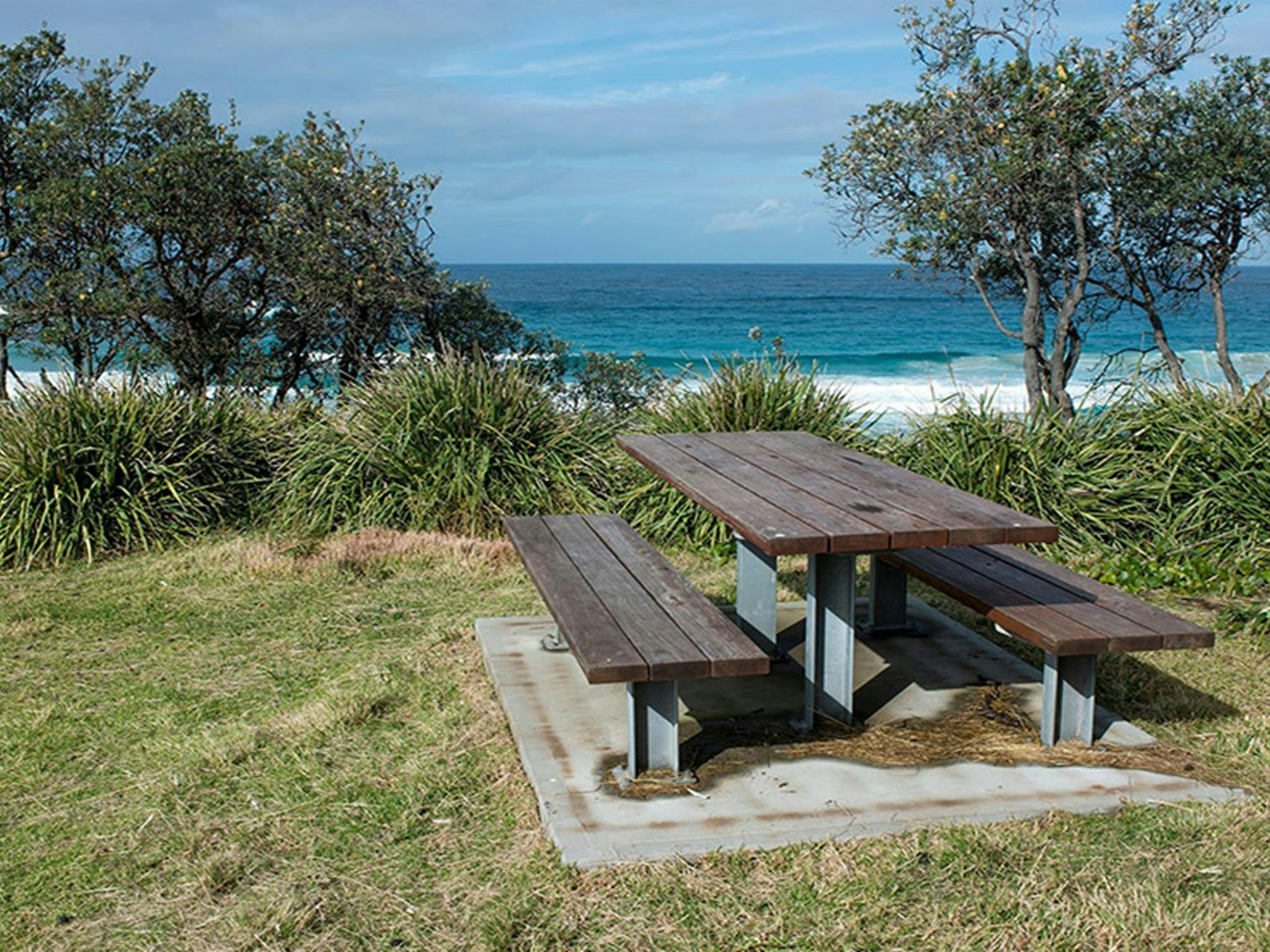 Picnic bench with views of the ocean at Stokes Island picnic area. Credit: Michael Van Ewijk &copy;