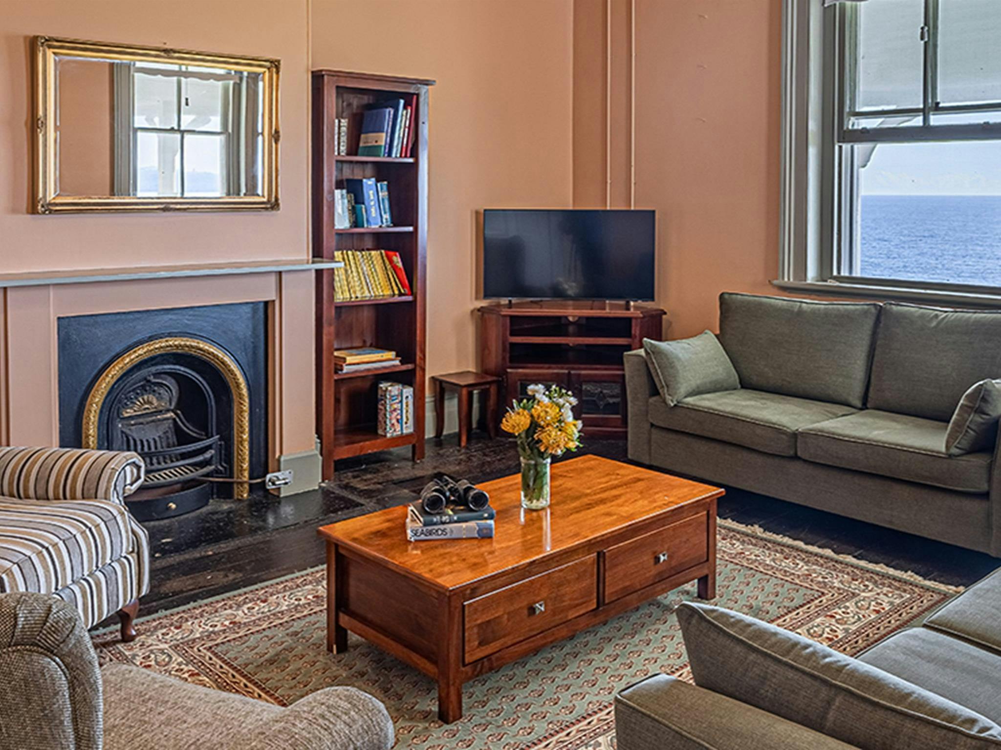 The cosy lounge room at Montague Island Assistant Lighthouse Keeper's Cottage. Photo &copy; David