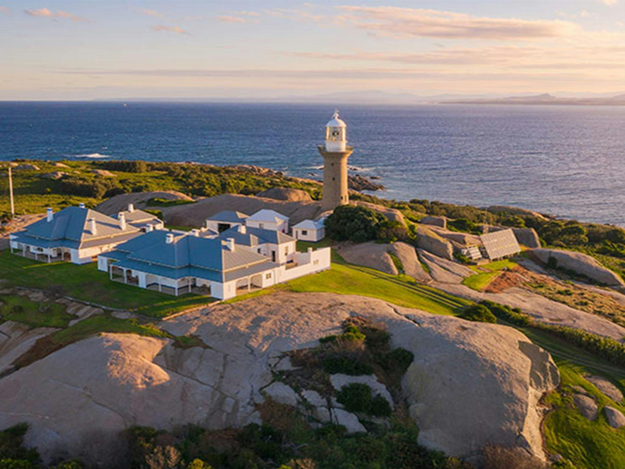 Aerial view of Montague Island lighthouse and cottage at sunset. Photo: Daniel Tran/OEH