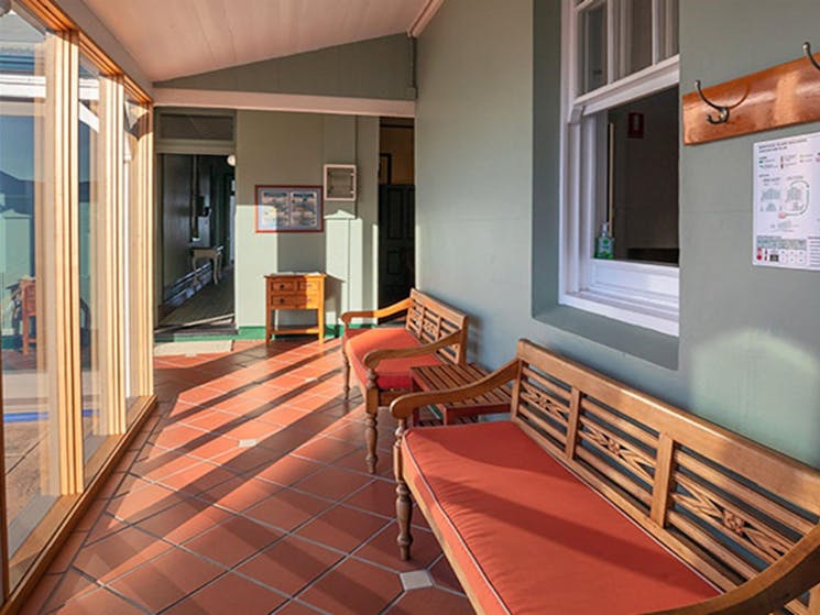 Bench seats on the verandah at Montague Island Head Lighthouse Keepers Cottage. Photo: Daniel